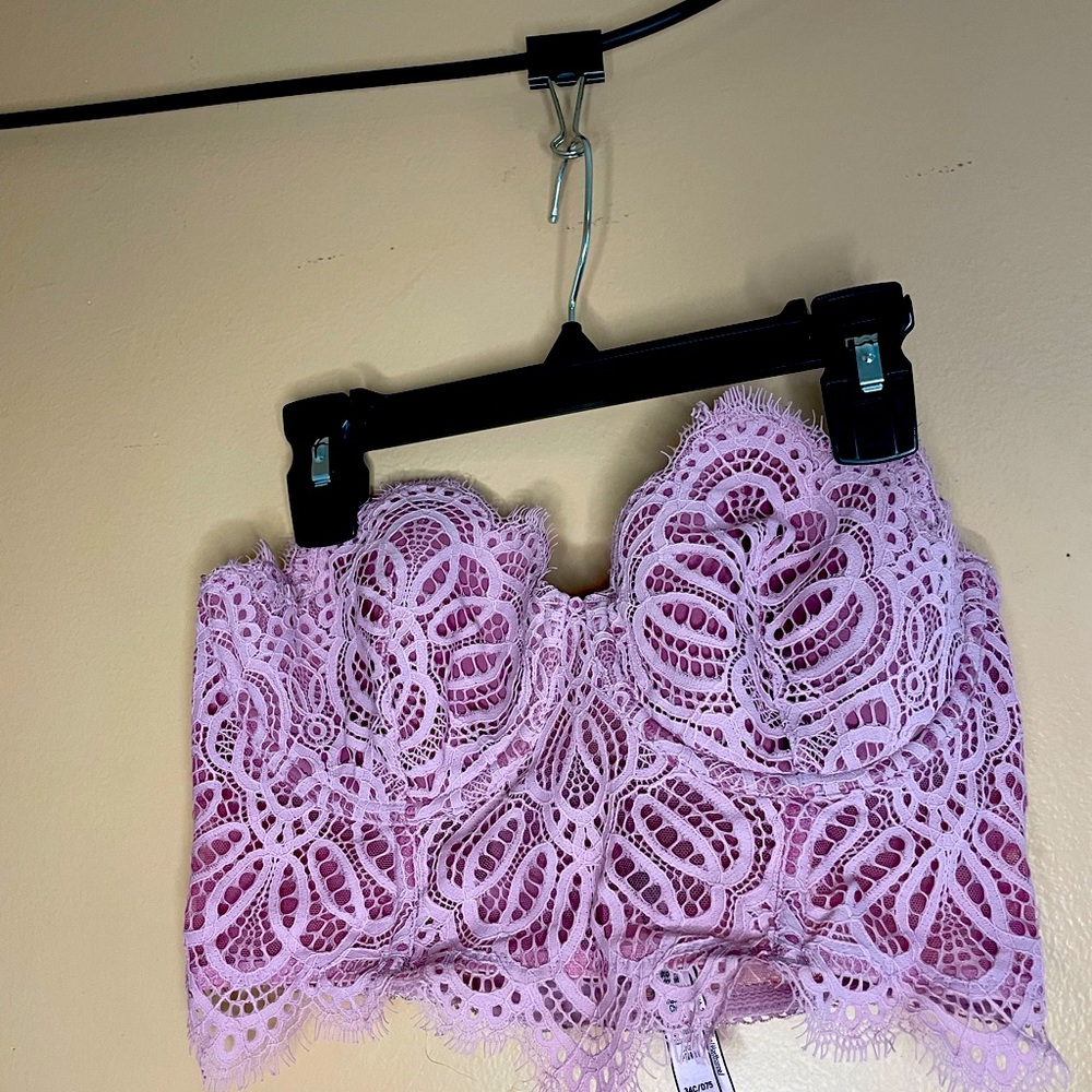 Light pink corset, with clips on the back.